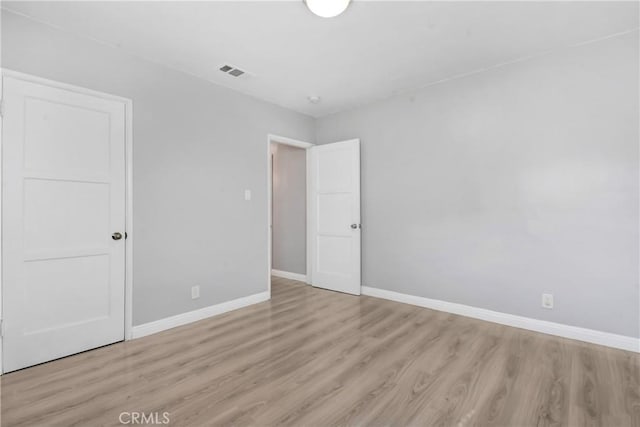 1510 E Idahome St, West Covina, CA 91791 - unfurnished bedroom with baseboards and light wood finished floors