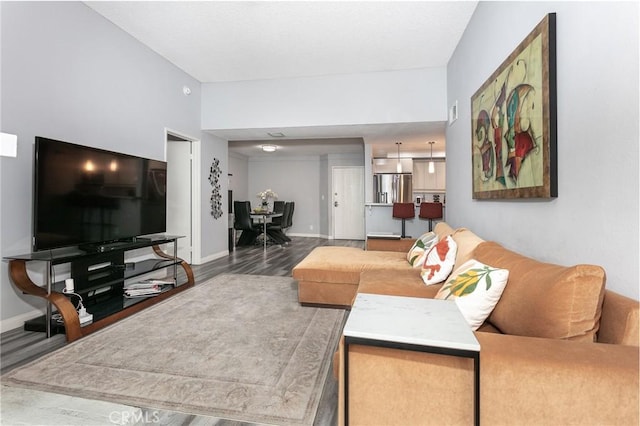7800 Topanga Canyon Blvd Unit 324, Canoga Park, CA 91304 - living area featuring wood finished floors and baseboards