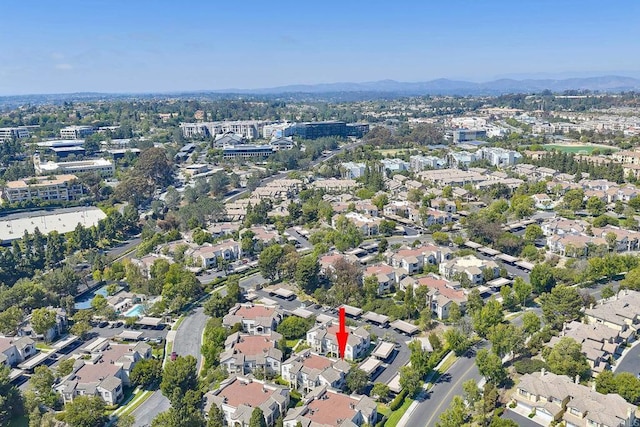 3521 Caminito El Rincon Unit 307, San Diego, CA 92130 - aerial overview of property's location with mountains and nearby suburban area