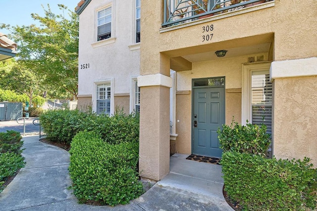 3521 Caminito El Rincon Unit 307, San Diego, CA 92130 - entrance to property featuring stucco siding