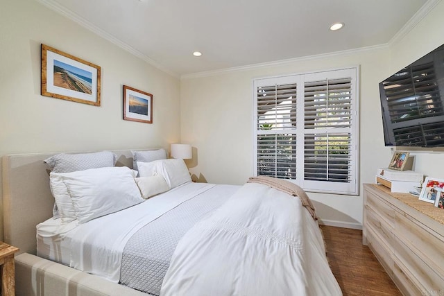 3521 Caminito El Rincon Unit 307, San Diego, CA 92130 - bedroom featuring dark wood-style flooring, ornamental molding, and recessed lighting