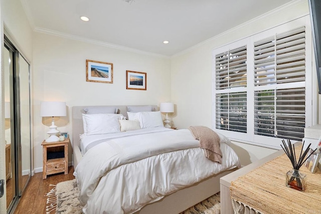 3521 Caminito El Rincon Unit 307, San Diego, CA 92130 - bedroom featuring wood finished floors, crown molding, and recessed lighting