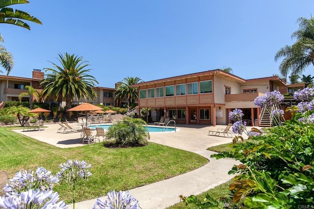 6812 Hyde Park Dr Unit G, San Diego, CA 92119 - community pool featuring stairway, a patio area, and a lawn