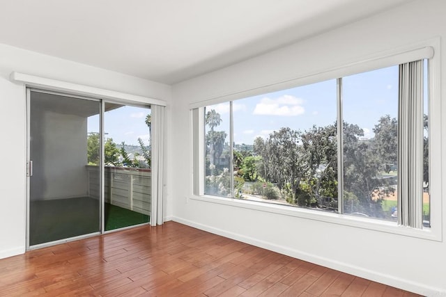 6812 Hyde Park Dr Unit G, San Diego, CA 92119 - empty room with baseboards and wood finished floors