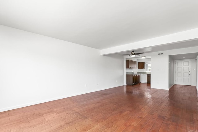6812 Hyde Park Dr Unit G, San Diego, CA 92119 - unfurnished living room with ceiling fan and dark wood finished floors