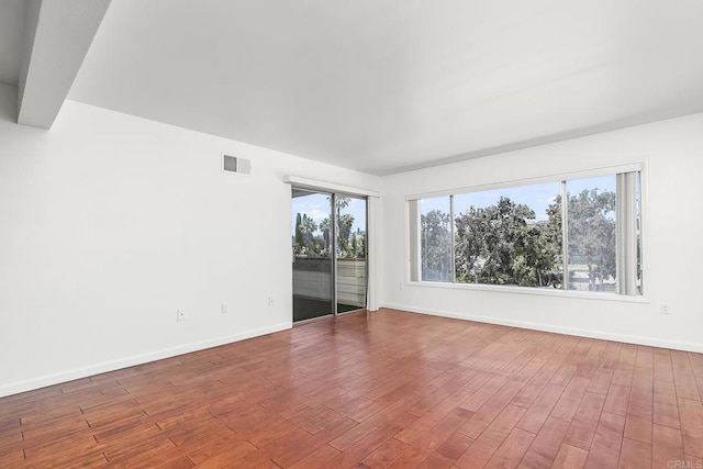 6812 Hyde Park Dr Unit G, San Diego, CA 92119 - unfurnished room with wood finished floors and baseboards