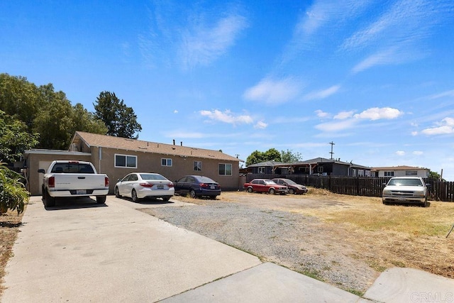 7023 Lisbon St, San Diego, CA 92114 - view of front of home with uncovered parking and a residential view