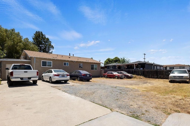 7023 Lisbon St, San Diego, CA 92114 - view of front of property featuring uncovered parking and a residential view