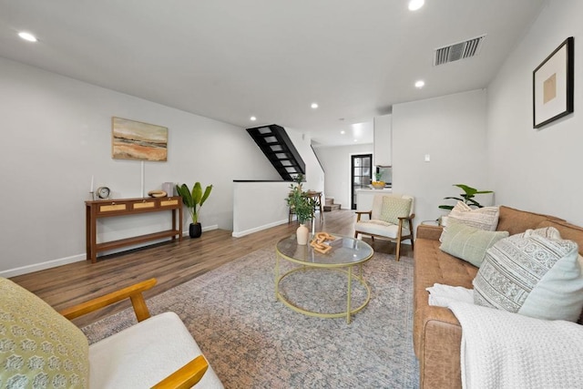 2282 Caminito Pescado Unit 44, San Diego, CA 92107 - living room featuring stairs, wood finished floors, and recessed lighting