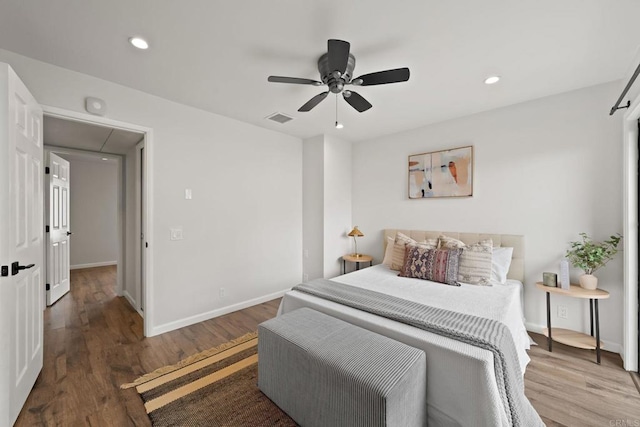 2282 Caminito Pescado Unit 44, San Diego, CA 92107 - bedroom with wood finished floors, recessed lighting, ceiling fan, and attic access