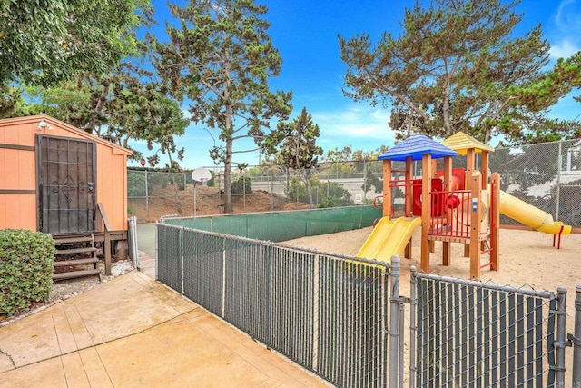 2282 Caminito Pescado Unit 44, San Diego, CA 92107 - view of tennis court featuring a shed and a gate