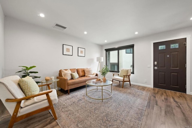 2282 Caminito Pescado Unit 44, San Diego, CA 92107 - living area featuring wood finished floors and recessed lighting
