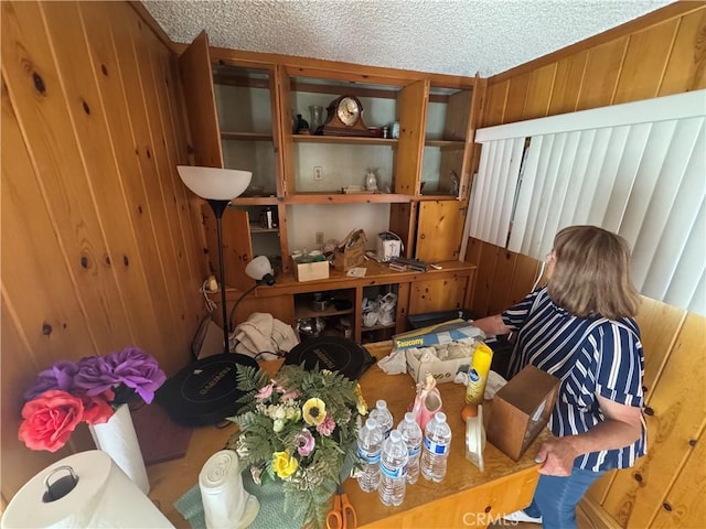 16931 E Rinaldi St, Granada Hills, CA 91344 - miscellaneous room featuring wood walls and a textured ceiling