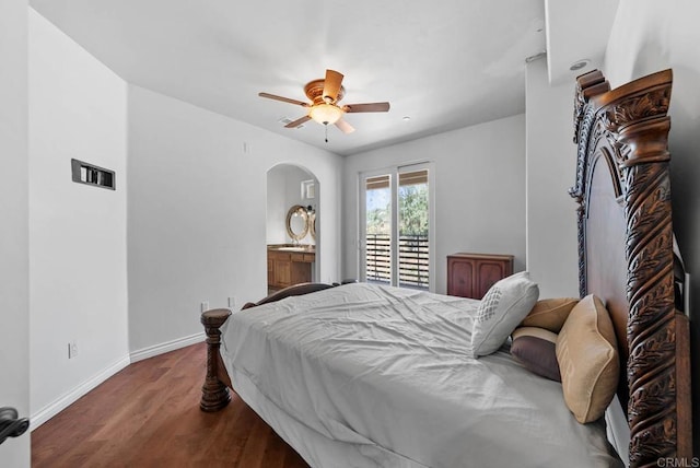 20202 Deerhorn Valley Rd, Jamul, CA 91935 - bedroom featuring wood finished floors, arched walkways, a ceiling fan, and ensuite bath