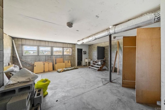 20202 Deerhorn Valley Rd, Jamul, CA 91935 - miscellaneous room with unfinished concrete flooring and concrete block wall