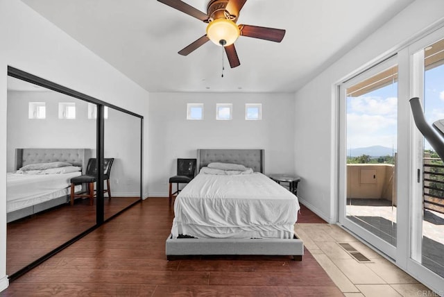 20202 Deerhorn Valley Rd, Jamul, CA 91935 - bedroom with access to outside, multiple windows, and wood finished floors