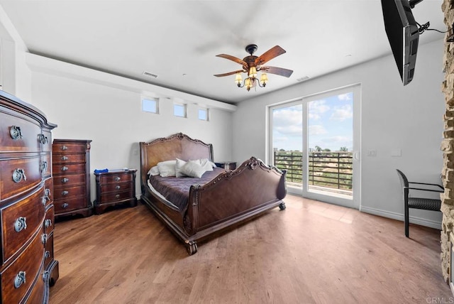 20202 Deerhorn Valley Rd, Jamul, CA 91935 - bedroom with access to exterior, wood finished floors, and a ceiling fan