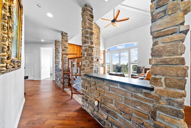 20202 Deerhorn Valley Rd, Jamul, CA 91935 - hallway with ornate columns, wood finished floors, recessed lighting, and high vaulted ceiling