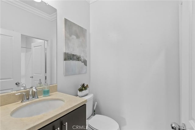 17557 Newland St Unit 101, Huntington Beach, CA 92647 - bathroom featuring vanity and ornamental molding