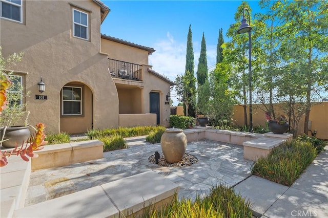 17557 Newland St Unit 101, Huntington Beach, CA 92647 - patio / terrace with a patio area