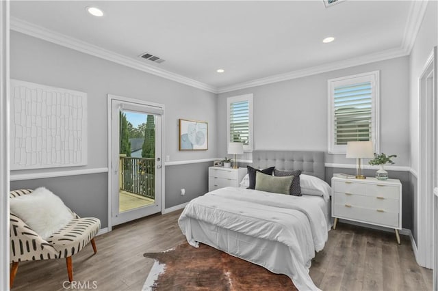 17557 Newland St Unit 101, Huntington Beach, CA 92647 - bedroom featuring access to exterior, wood finished floors, crown molding, and recessed lighting