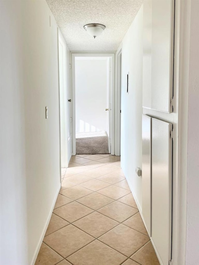 1249 Arcadia Ave, Vista, CA 92084 - hall featuring a textured ceiling and light tile patterned flooring
