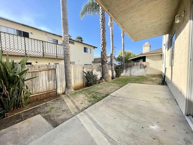 1249 Arcadia Ave, Vista, CA 92084 - fenced backyard with a patio