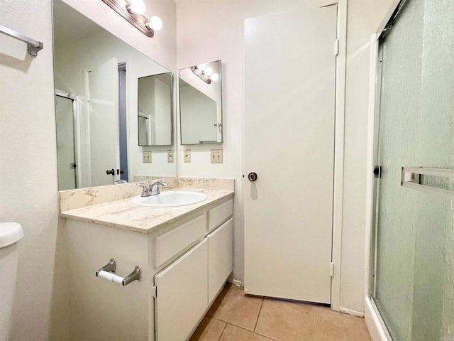 1249 Arcadia Ave, Vista, CA 92084 - full bath with tile patterned floors, a shower stall, and vanity