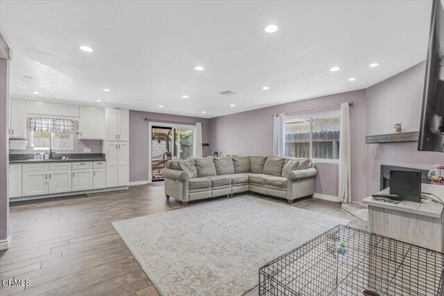 118 Everest St, Oxnard, CA 93030 - living area featuring plenty of natural light, wood finished floors, and recessed lighting