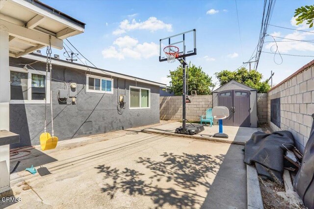118 Everest St, Oxnard, CA 93030 - fenced backyard featuring a storage shed and a patio