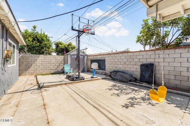 118 Everest St, Oxnard, CA 93030 - fenced backyard featuring a storage shed and a patio area