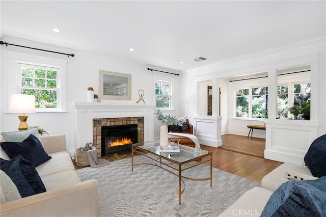 802 S Arroyo Blvd, Pasadena, CA 91105 - living room featuring wood finished floors, healthy amount of natural light, ornamental molding, a fireplace, and recessed lighting