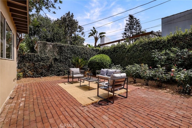 802 S Arroyo Blvd, Pasadena, CA 91105 - fenced backyard with a patio and an outdoor hangout area