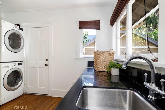 802 S Arroyo Blvd, Pasadena, CA 91105 - laundry area featuring stacked washer and clothes dryer and wood finished floors
