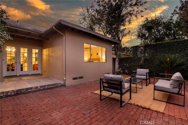 802 S Arroyo Blvd, Pasadena, CA 91105 - patio terrace at dusk featuring french doors, a patio, and outdoor lounge area