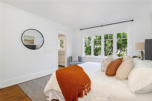 802 S Arroyo Blvd, Pasadena, CA 91105 - bedroom with crown molding, multiple windows, wood finished floors, and connected bathroom