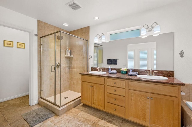 432 S Cleveland St, Oceanside, CA 92054 - bathroom featuring a shower stall, double vanity, and tile patterned floors