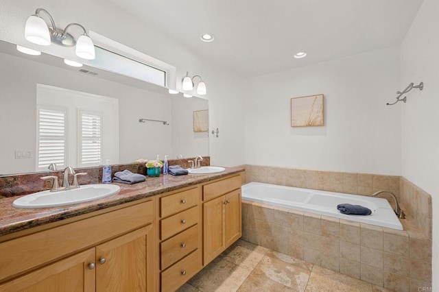 432 S Cleveland St, Oceanside, CA 92054 - bathroom featuring a garden tub and double vanity