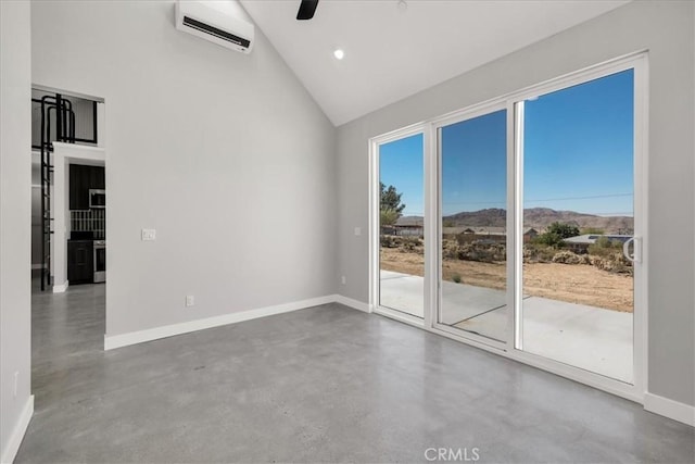 61850 Alta Mura Dr, Joshua Tree, CA 92252 - empty room with a wall unit AC, high vaulted ceiling, finished concrete flooring, a ceiling fan, and recessed lighting