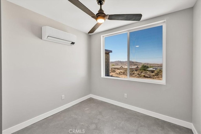 61850 Alta Mura Dr, Joshua Tree, CA 92252 - empty room featuring a wall mounted AC, concrete flooring, and a ceiling fan