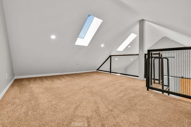 61850 Alta Mura Dr, Joshua Tree, CA 92252 - additional living space with a skylight, carpet flooring, vaulted ceiling, and recessed lighting