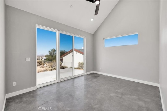 61850 Alta Mura Dr, Joshua Tree, CA 92252 - spare room featuring finished concrete flooring, ceiling fan, and high vaulted ceiling