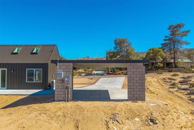 61850 Alta Mura Dr, Joshua Tree, CA 92252 - view of side of home featuring a cooling unit