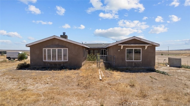 50802 280th St W, Lancaster, CA 93536 - view of front of house with a chimney and stucco siding