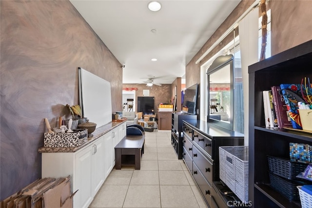 50802 280th St W, Lancaster, CA 93536 - kitchen with white cabinets, light tile patterned floors, recessed lighting, a ceiling fan, and dark stone countertops