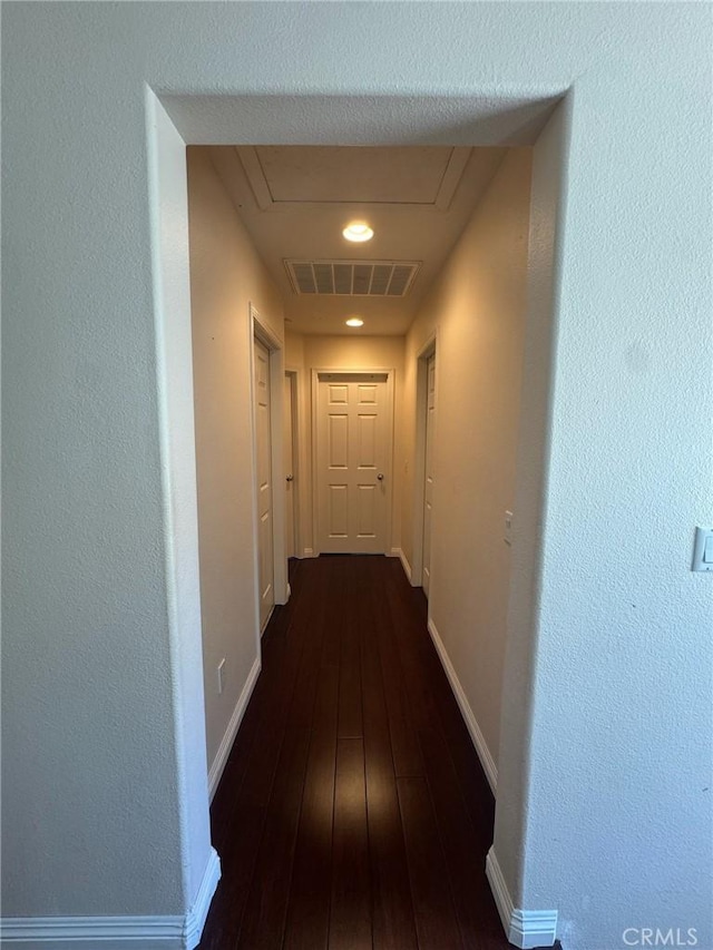 24112 Joshua Dr, Valencia, CA 91354 - corridor featuring dark wood-type flooring and baseboards