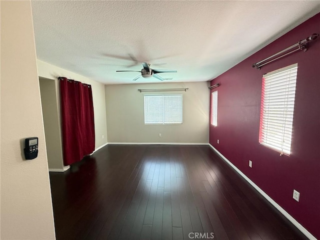 24112 Joshua Dr, Valencia, CA 91354 - spare room featuring ceiling fan and dark wood-style floors