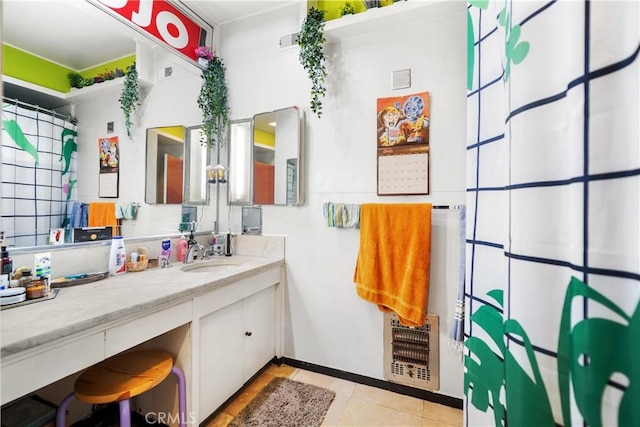 2511 W 5th St, Los Angeles, CA 90057 - bathroom with vanity, heating unit, tile patterned flooring, and a shower with curtain