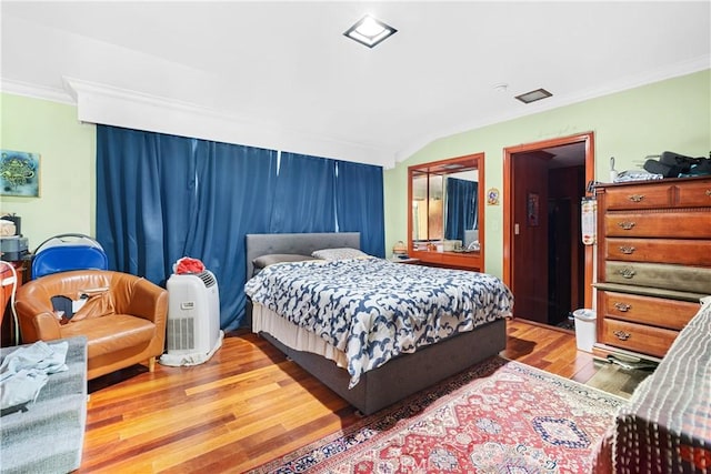 2511 W 5th St, Los Angeles, CA 90057 - bedroom with wood finished floors, crown molding, and vaulted ceiling