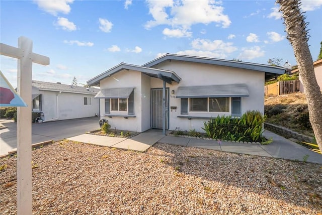 3648 Mira Pacific Dr, Oceanside, CA 92056 - view of front facade featuring stucco siding and concrete driveway
